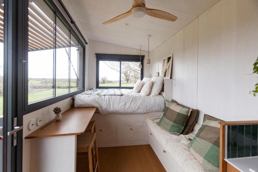 Postel nebo postele na pokoji v ubytování Pépiite Lodge Nature et Spa