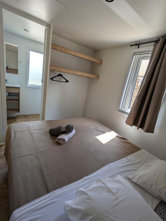 Postel nebo postele na pokoji v ubytování Gîte - Chez Gabriel et Julie