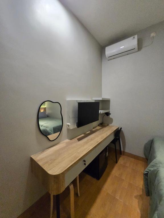 TV a/nebo společenská místnost v ubytování Rebahan Stay