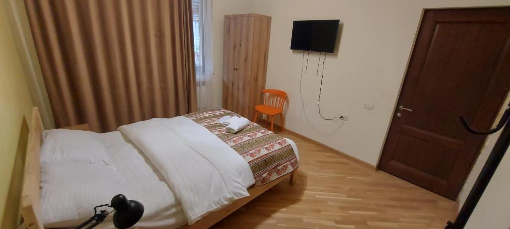 Postel nebo postele na pokoji v ubytování Kenut Hostel