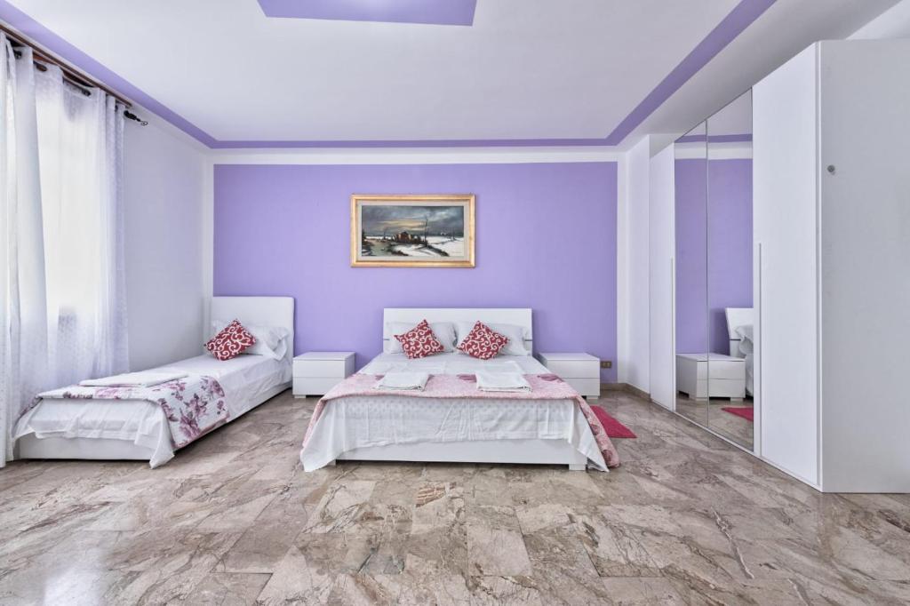 Postel nebo postele na pokoji v ubytování Venice Mahdi Apartment