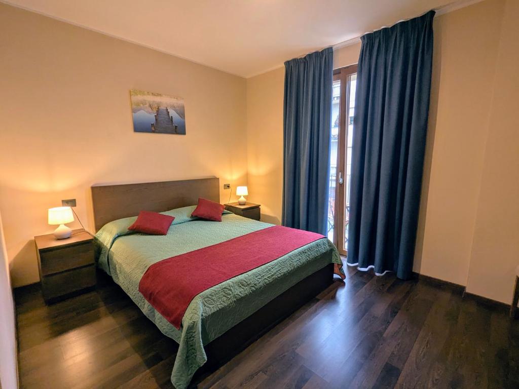 A bed or beds in a room at B&B Sul Lago