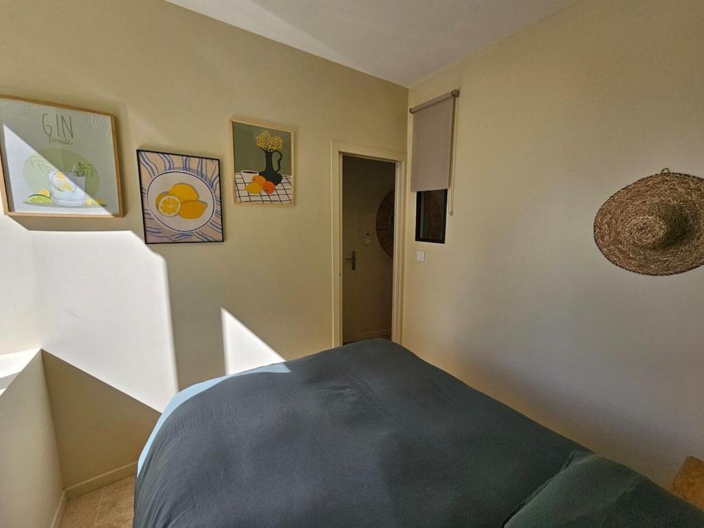 Postel nebo postele na pokoji v ubytování Le Loft de Genas - la Bastide, le Chalet, le Loft, le Mas, la Paillote