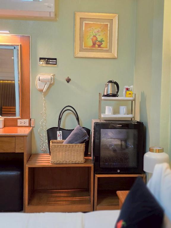 TV a/nebo společenská místnost v ubytování Chilli Hotel&Restaurant