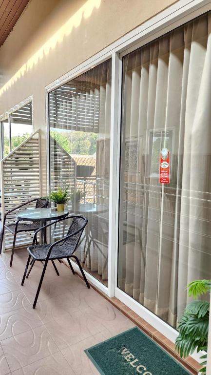 Balkón nebo terasa v ubytování Chilli Hotel&Restaurant