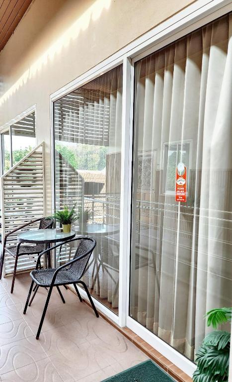 Balkón nebo terasa v ubytování Chilli Hotel&Restaurant