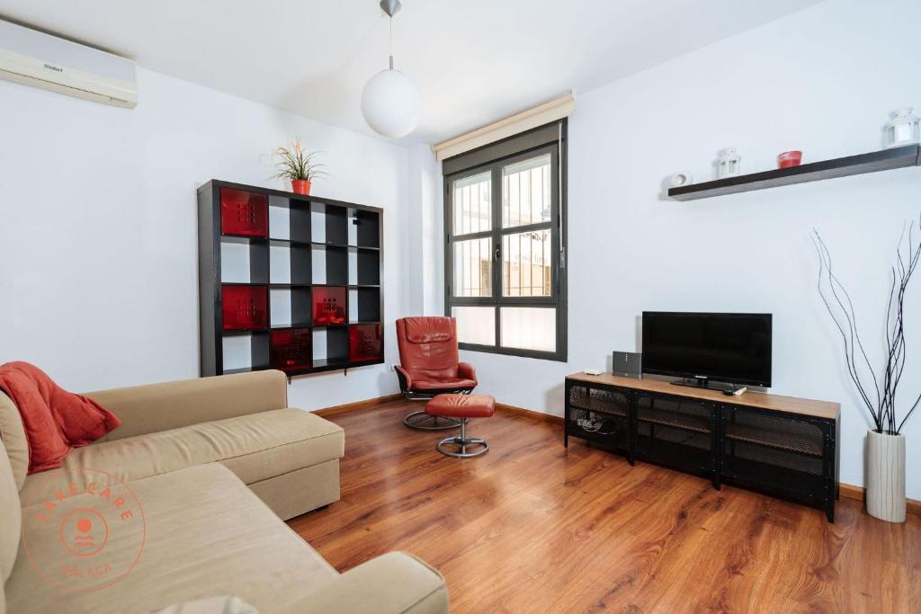 Televízia a/alebo spoločenská miestnosť v ubytovaní Apartment in heart of Malaga - TCM