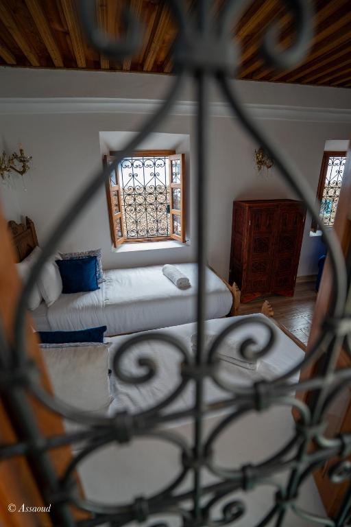 Postel nebo postele na pokoji v ubytování Riad dar chama