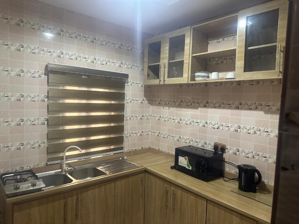 AM Apartmentsにあるキッチンまたは簡易キッチン