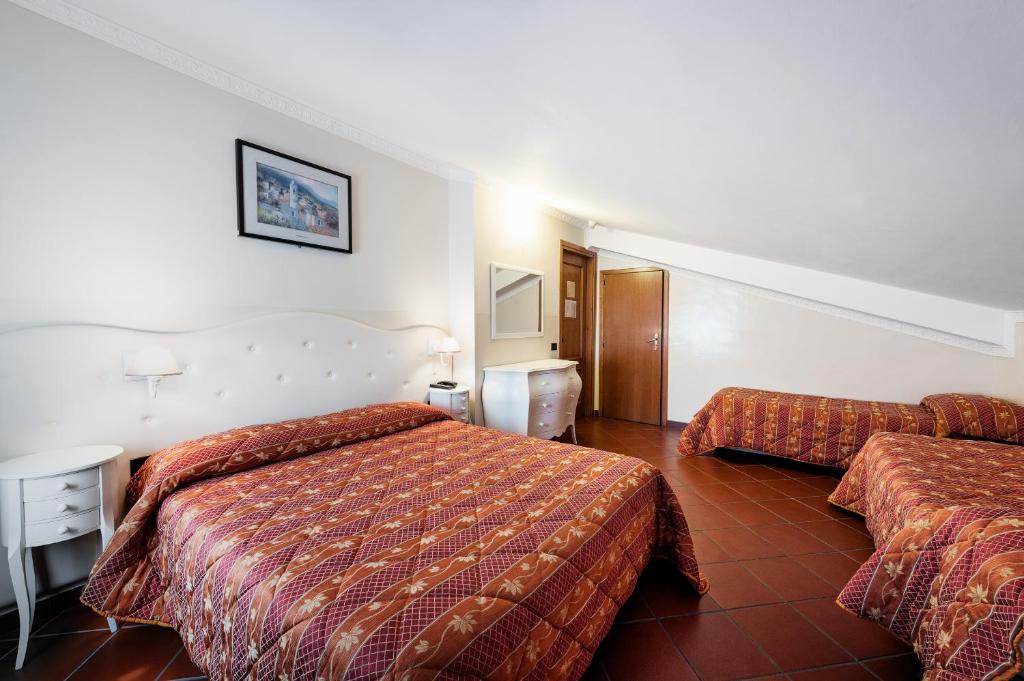Postel nebo postele na pokoji v ubytování Hotel Edelweiss