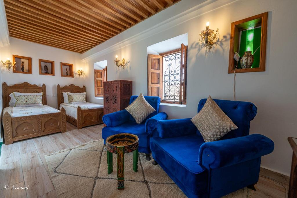 Postel nebo postele na pokoji v ubytování Riad dar chama