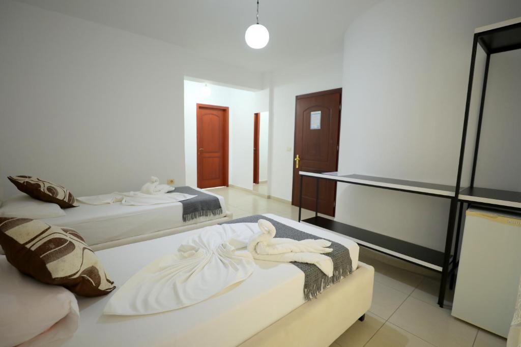 Postel nebo postele na pokoji v ubytování Hotel Soan