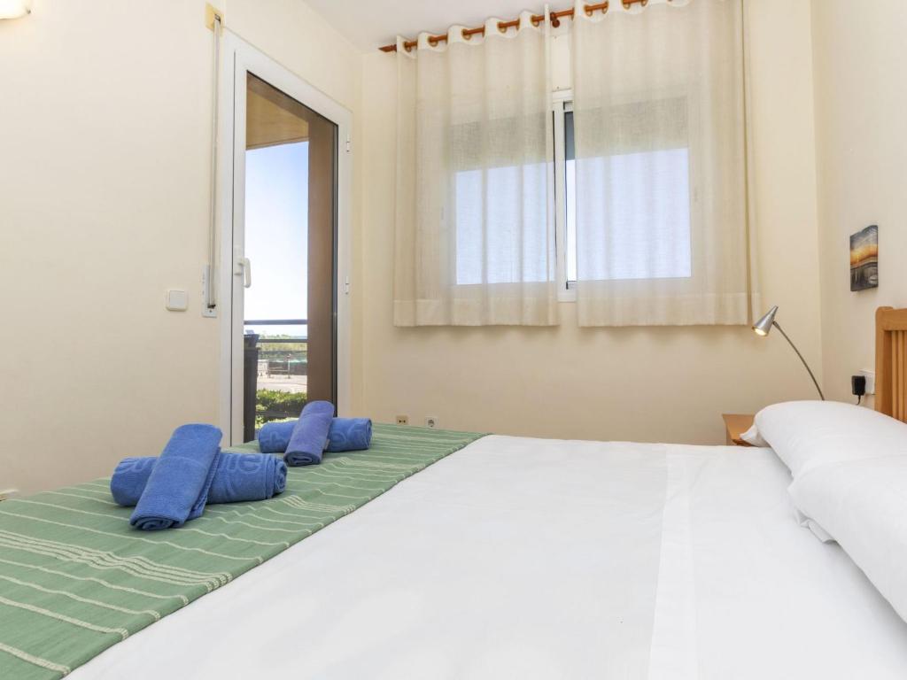 Posteľ alebo postele v izbe v ubytovaní Apartment Port Pals C II by Interhome