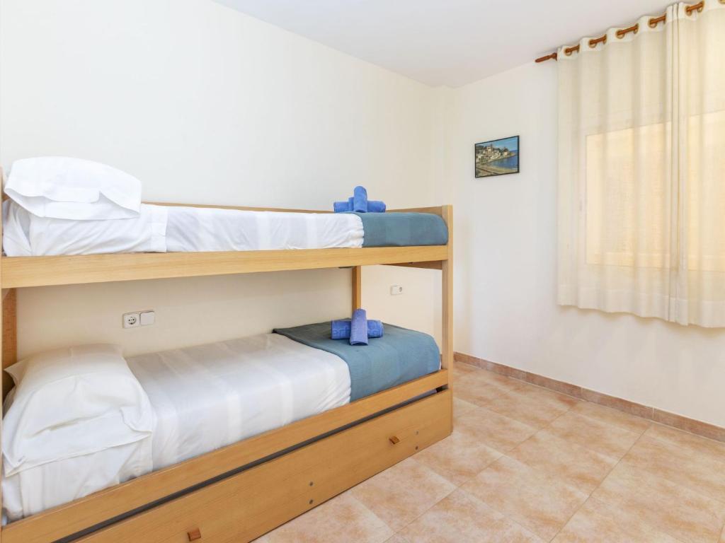 Posteľ alebo postele v izbe v ubytovaní Apartment Port Pals C II by Interhome