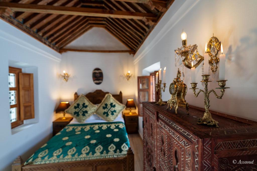 Postel nebo postele na pokoji v ubytování Riad dar chama