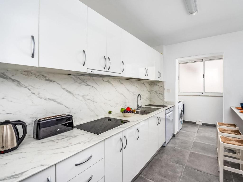 A kitchen or kitchenette at Apartment Carihuela Playa-2 by Interhome