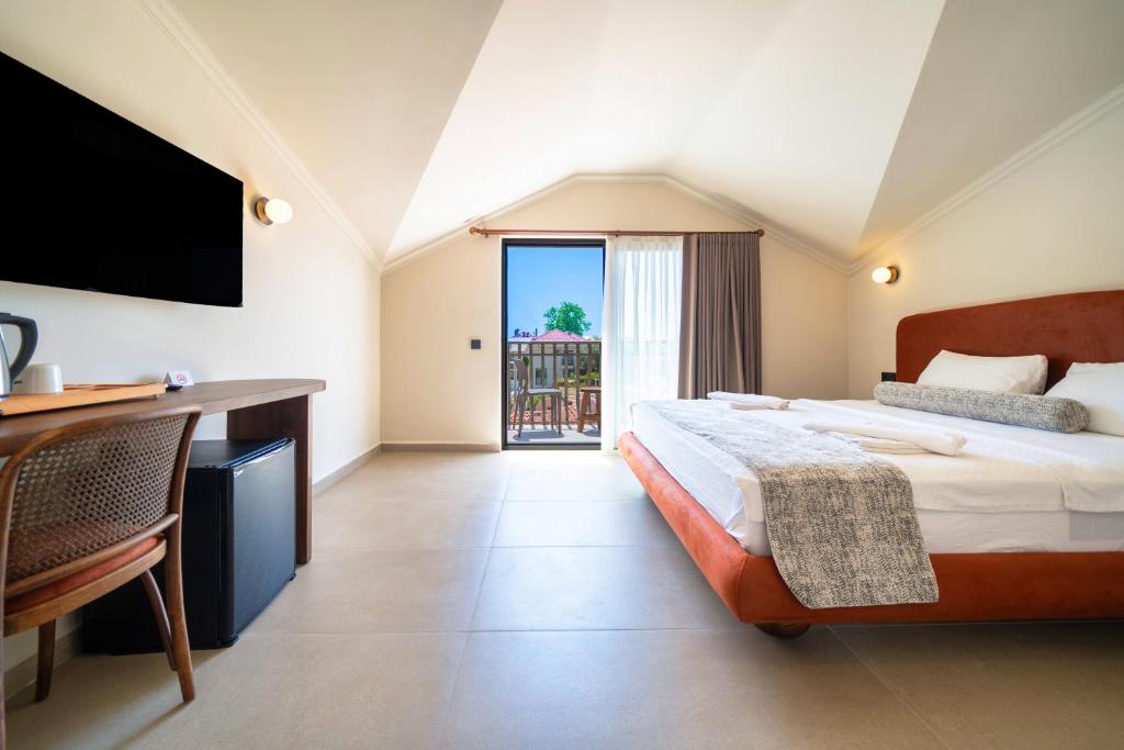 Postel nebo postele na pokoji v ubytování Magic Tulip Beach Hotel