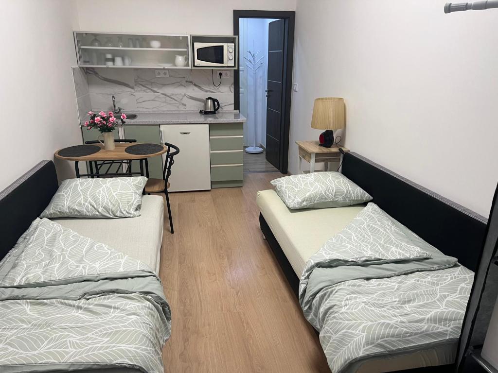 Postel nebo postele na pokoji v ubytování UbytkoMácháč