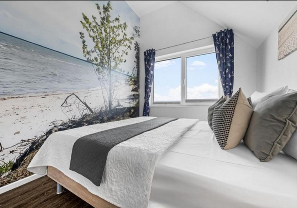 Postel nebo postele na pokoji v ubytování Ferienwohnung Admiral Suite
