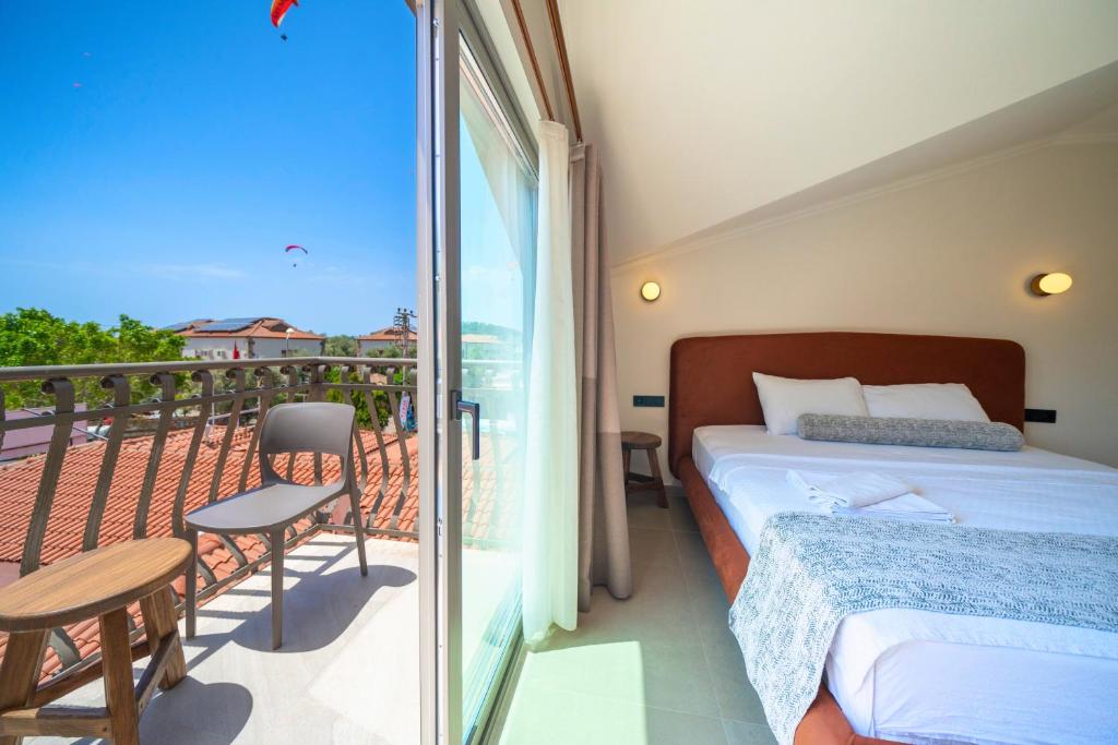 Postel nebo postele na pokoji v ubytování Magic Tulip Beach Hotel