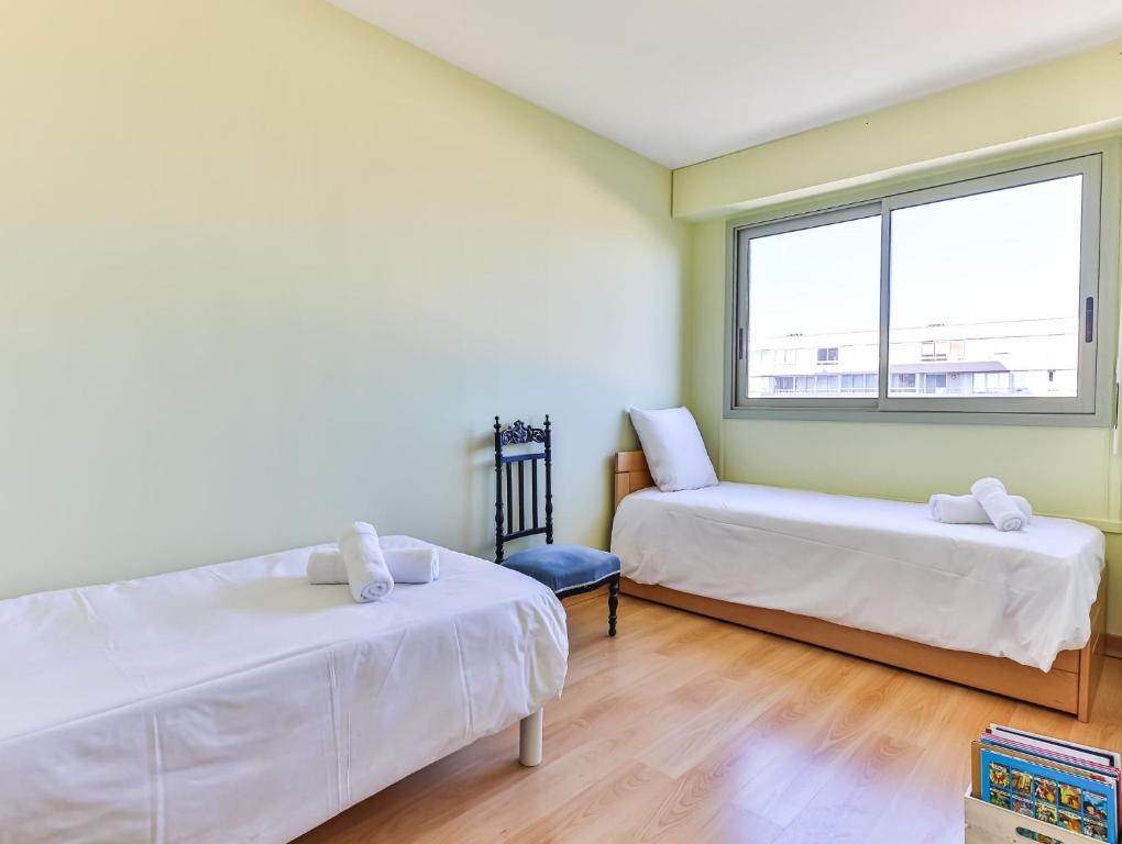 Posteľ alebo postele v izbe v ubytovaní Les Salines - Appartement - Gare des Sables