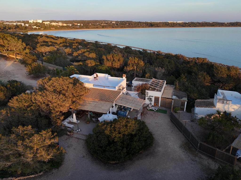 an overhead view of a large house with a lake at Casa Armonia in Illes Balears