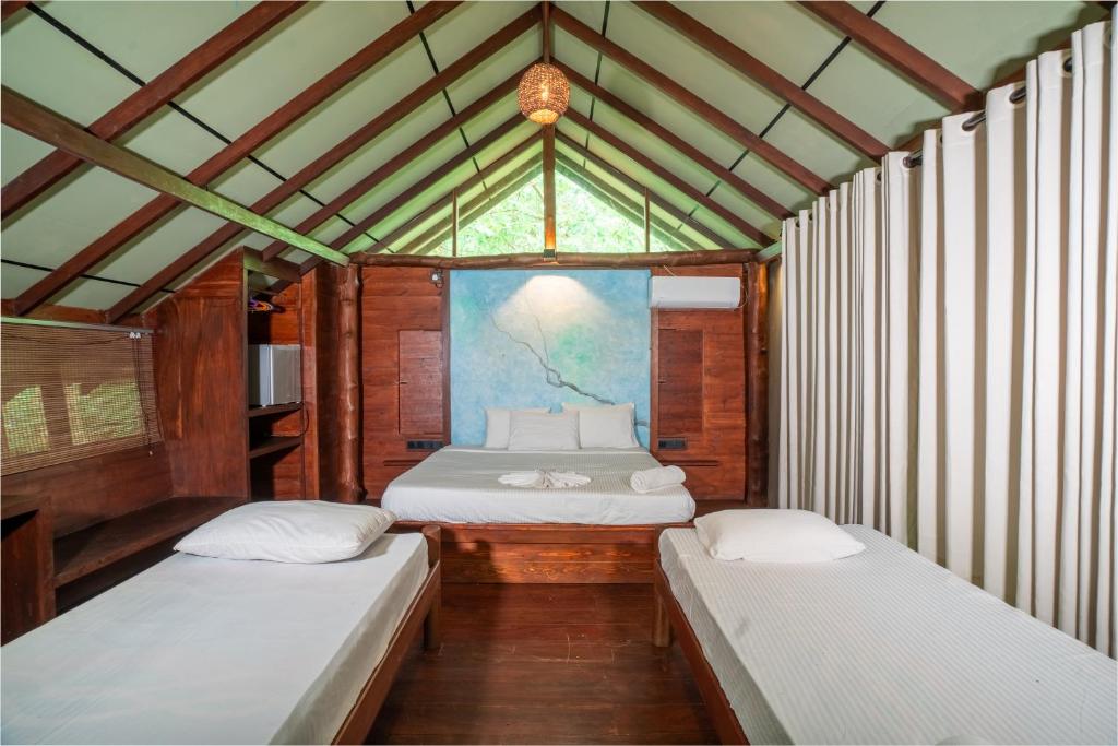 Postel nebo postele na pokoji v ubytování Kaala Kalaththewa Luxury Eco Resort
