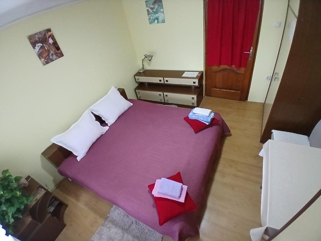 Una cama o camas en una habitación de sobe MAŠA
