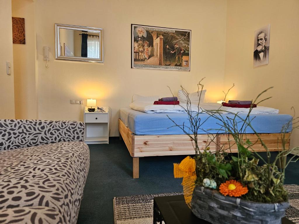 Postel nebo postele na pokoji v ubytování Cityappartement am Theaterplatz