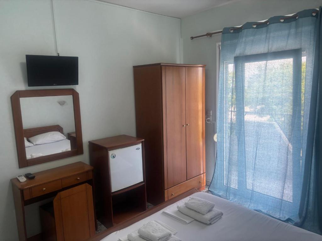 Postel nebo postele na pokoji v ubytování Indigo sea view rooms