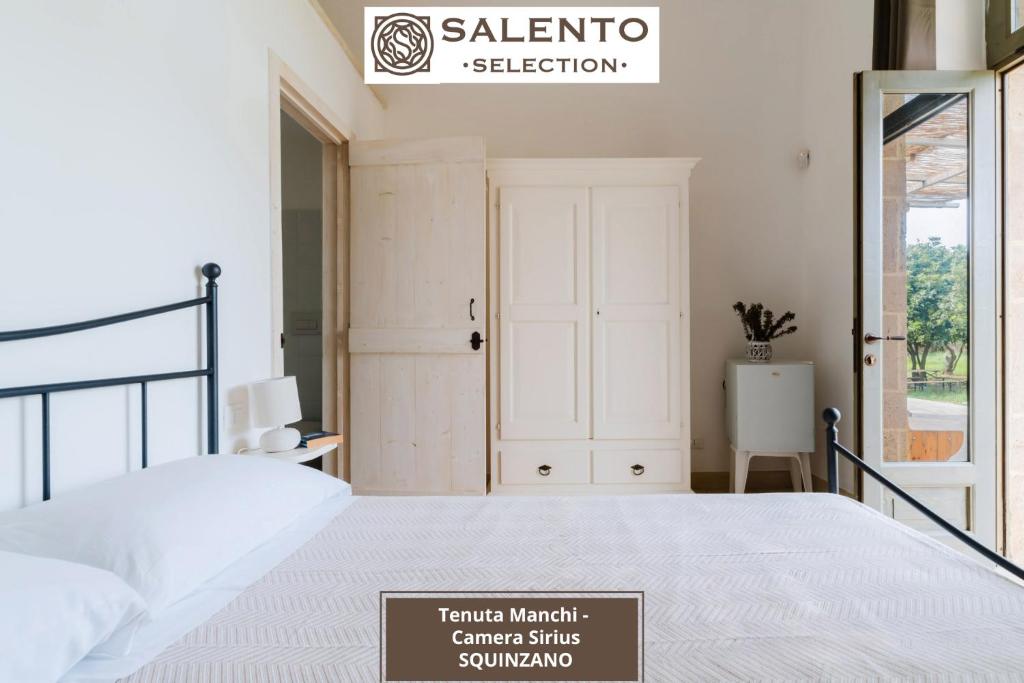 Katil atau katil-katil dalam bilik di Tenuta Manchi Rooms - Salento Selection