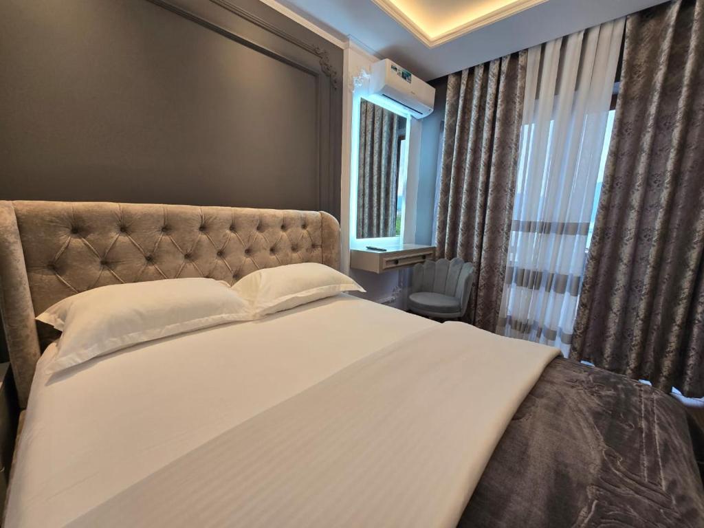 Postel nebo postele na pokoji v ubytování Hotel Belvedere