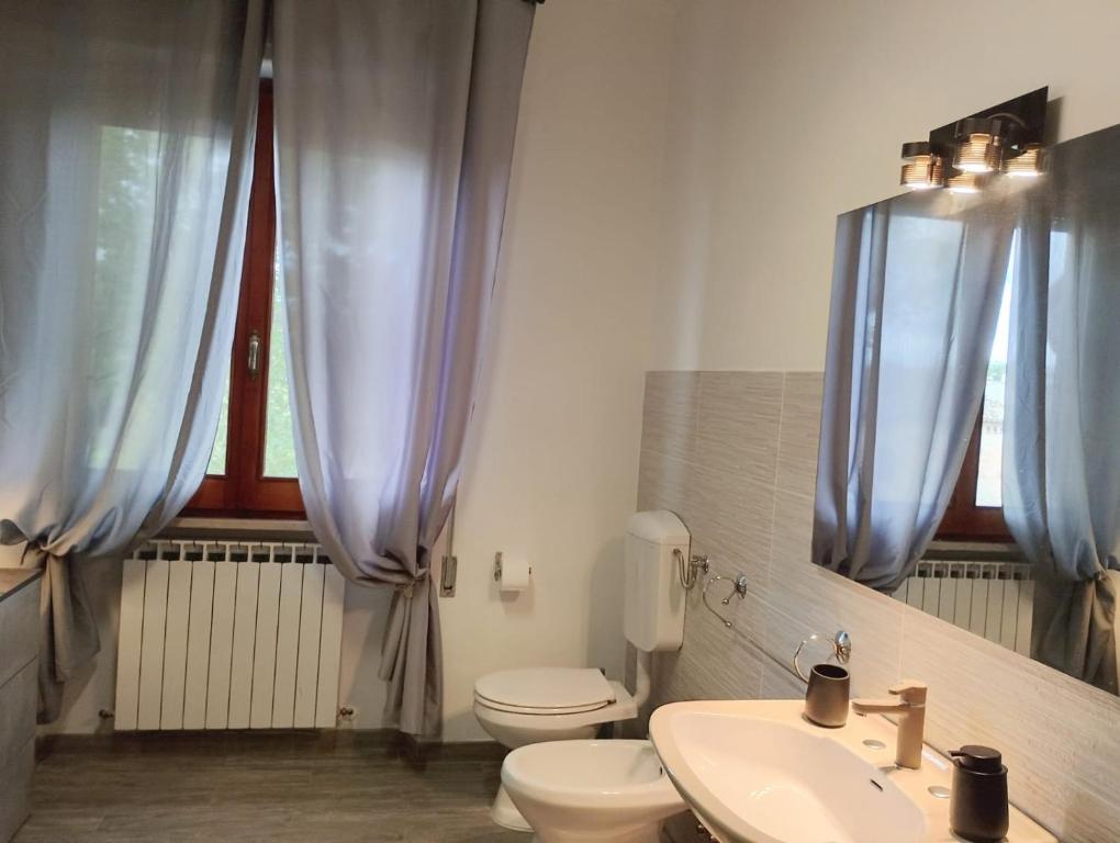 Koupelna v ubytování FalcoBianco GuestHouse