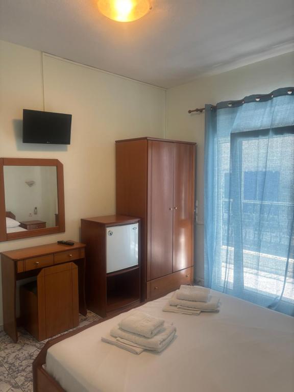 Postel nebo postele na pokoji v ubytování Indigo sea view rooms