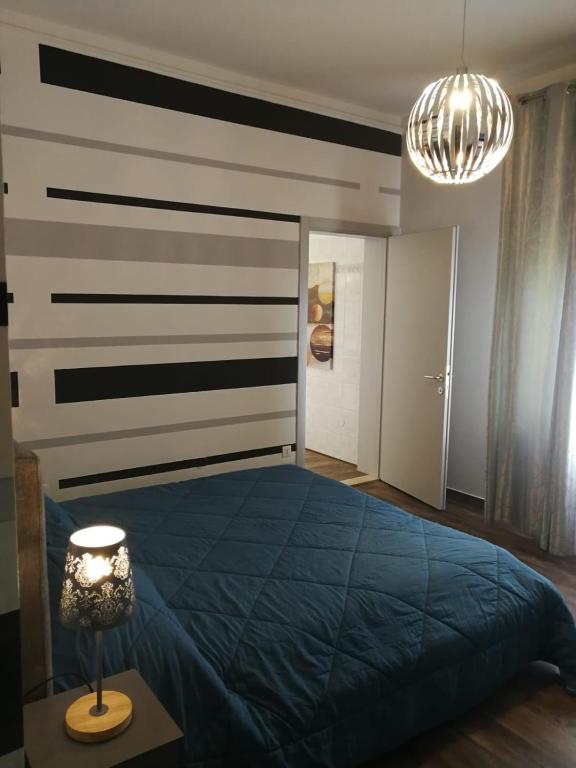 Postel nebo postele na pokoji v ubytování FalcoBianco GuestHouse