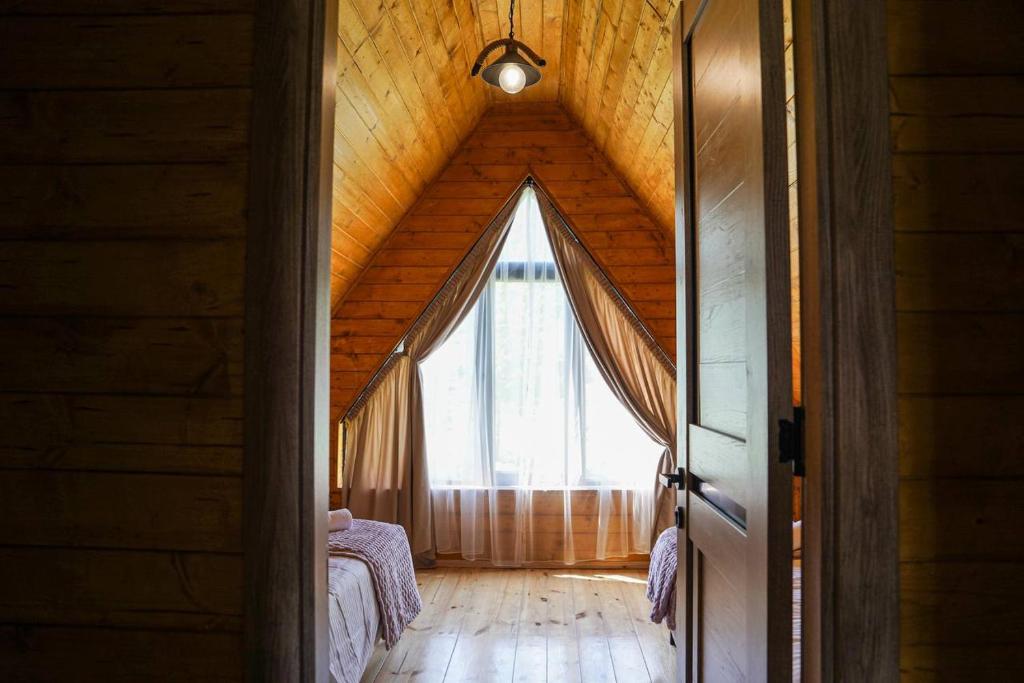 Postel nebo postele na pokoji v ubytování Tuta Area Cottage