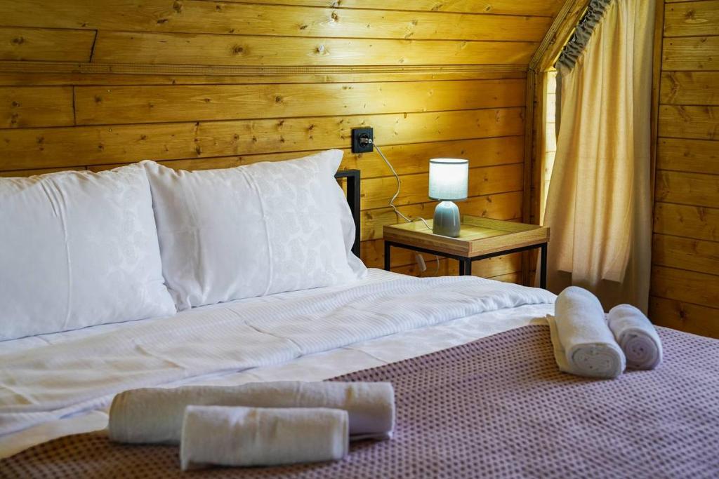 Postel nebo postele na pokoji v ubytování Tuta Area Cottage