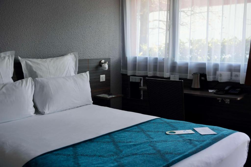 Postel nebo postele na pokoji v ubytování Sure Hotel by Best Western Biarritz Aeroport