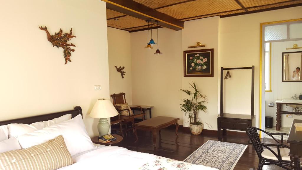 Giường trong phòng chung tại Villa Mungkala