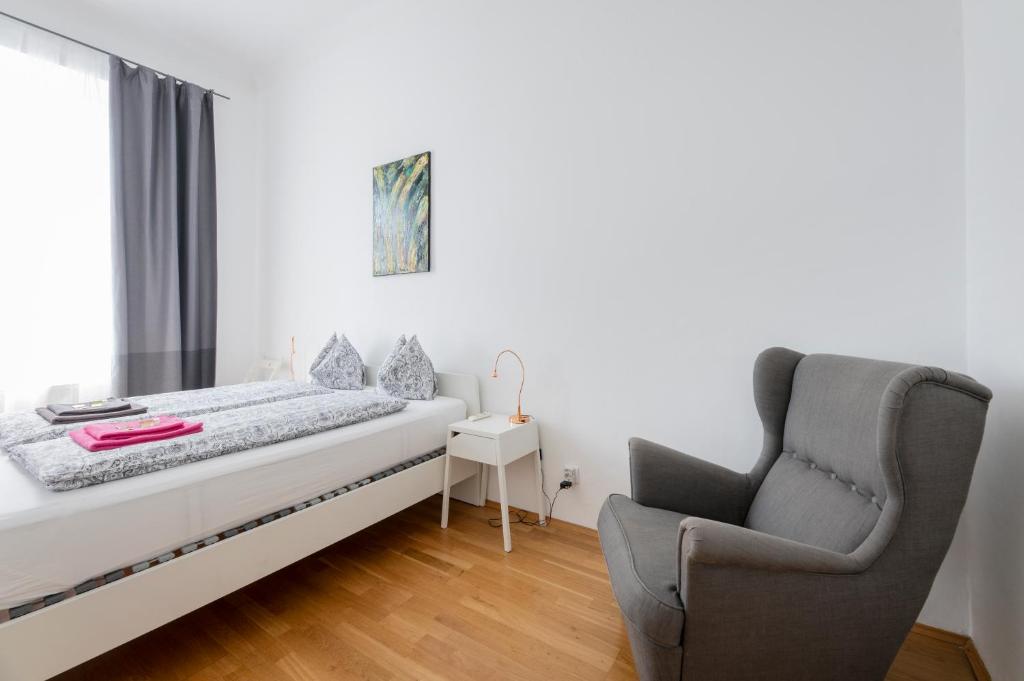 Posteľ alebo postele v izbe v ubytovaní City-Apartments Graz