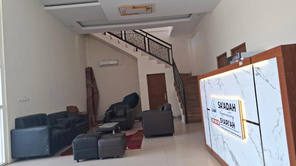 Posezení v ubytování Homestay Sa'adah