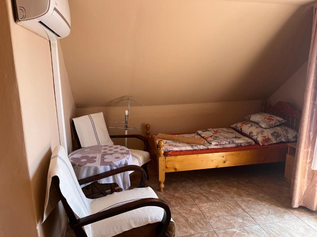 Posteľ alebo postele v izbe v ubytovaní Jázmin-Szieszta Apartmanház Balatonfüred