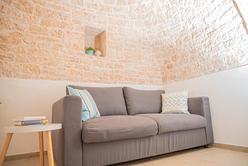 Posezení v ubytování Trullo Pietra Cannella