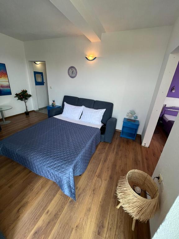 Postel nebo postele na pokoji v ubytování Hotel NEMO