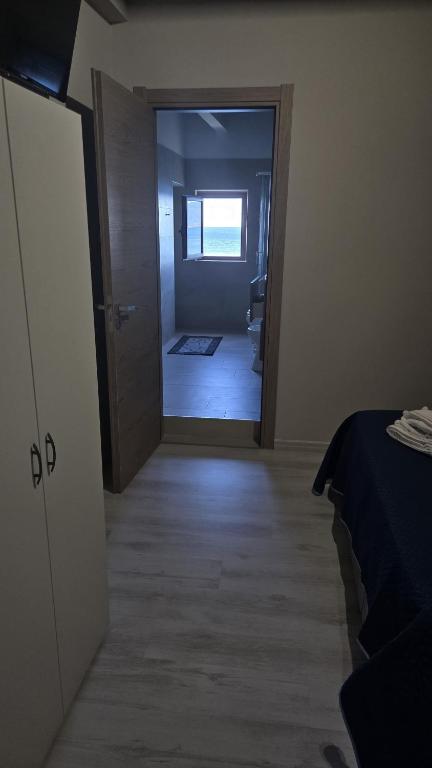 Postel nebo postele na pokoji v ubytování Casa Vacanze Mannara