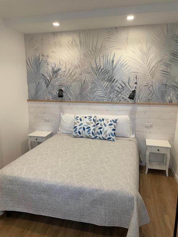 Postel nebo postele na pokoji v ubytování Catalogna10 Rooms