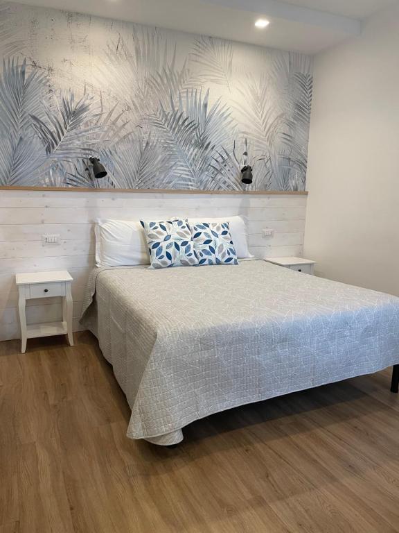 Postel nebo postele na pokoji v ubytování Catalogna10 Rooms