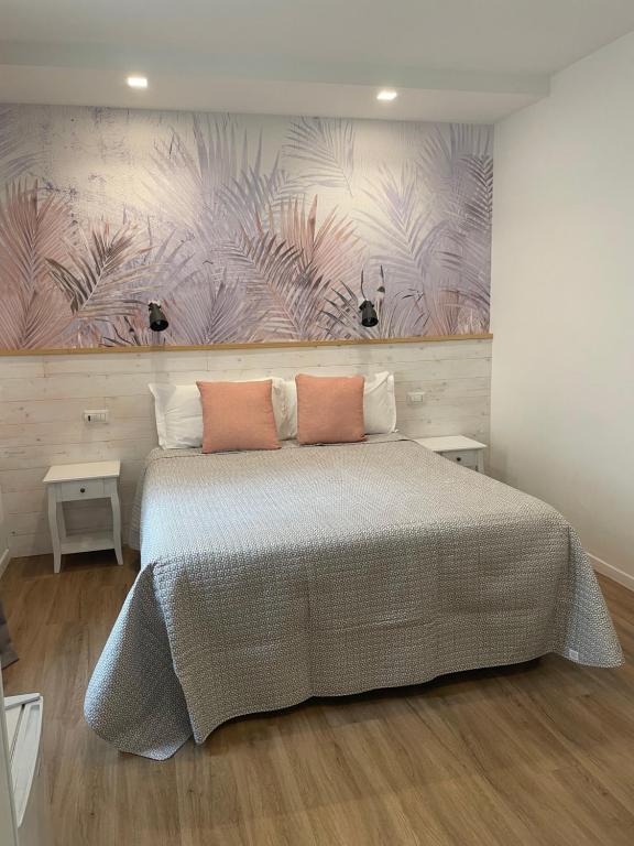 Postel nebo postele na pokoji v ubytování Catalogna10 Rooms