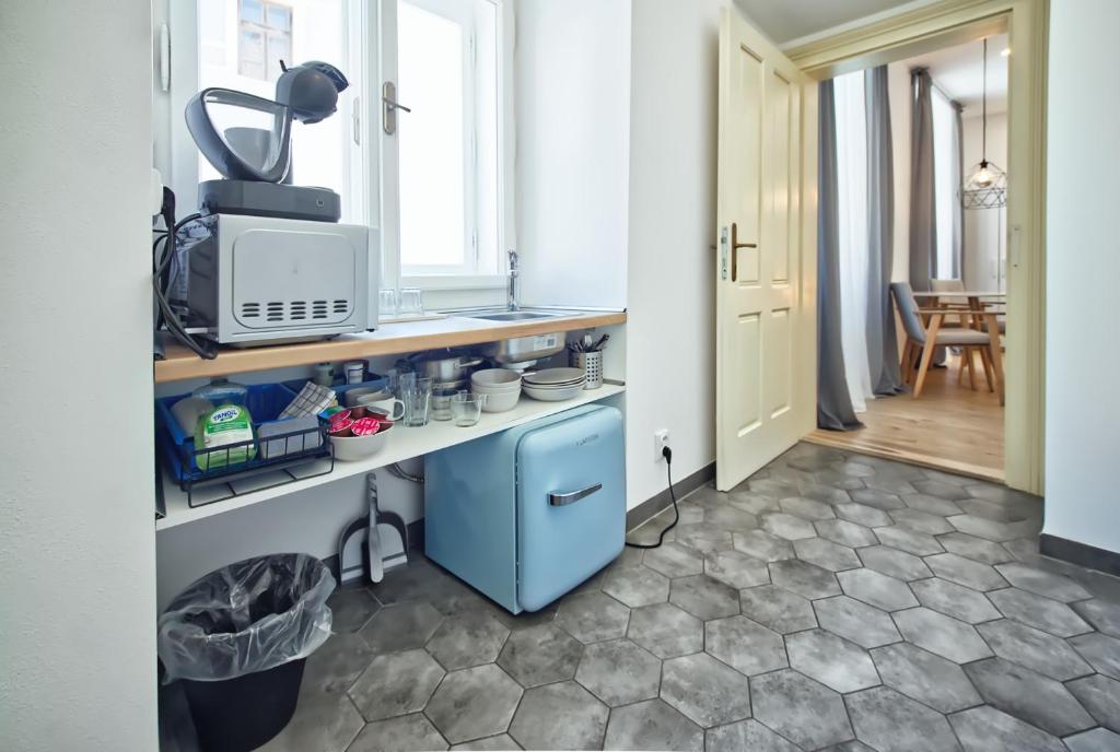 Kuchyň nebo kuchyňský kout v ubytování Apartmány VIENNA