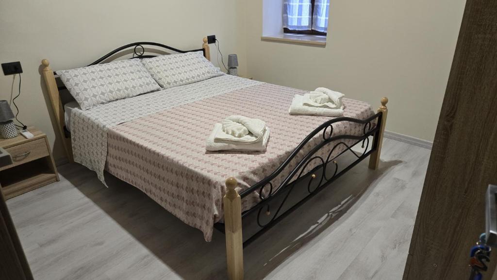 Postel nebo postele na pokoji v ubytování Casa Vacanze Mannara